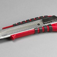 Cutter professionale con lama da 25 mm in acciaio gommato autobloccante